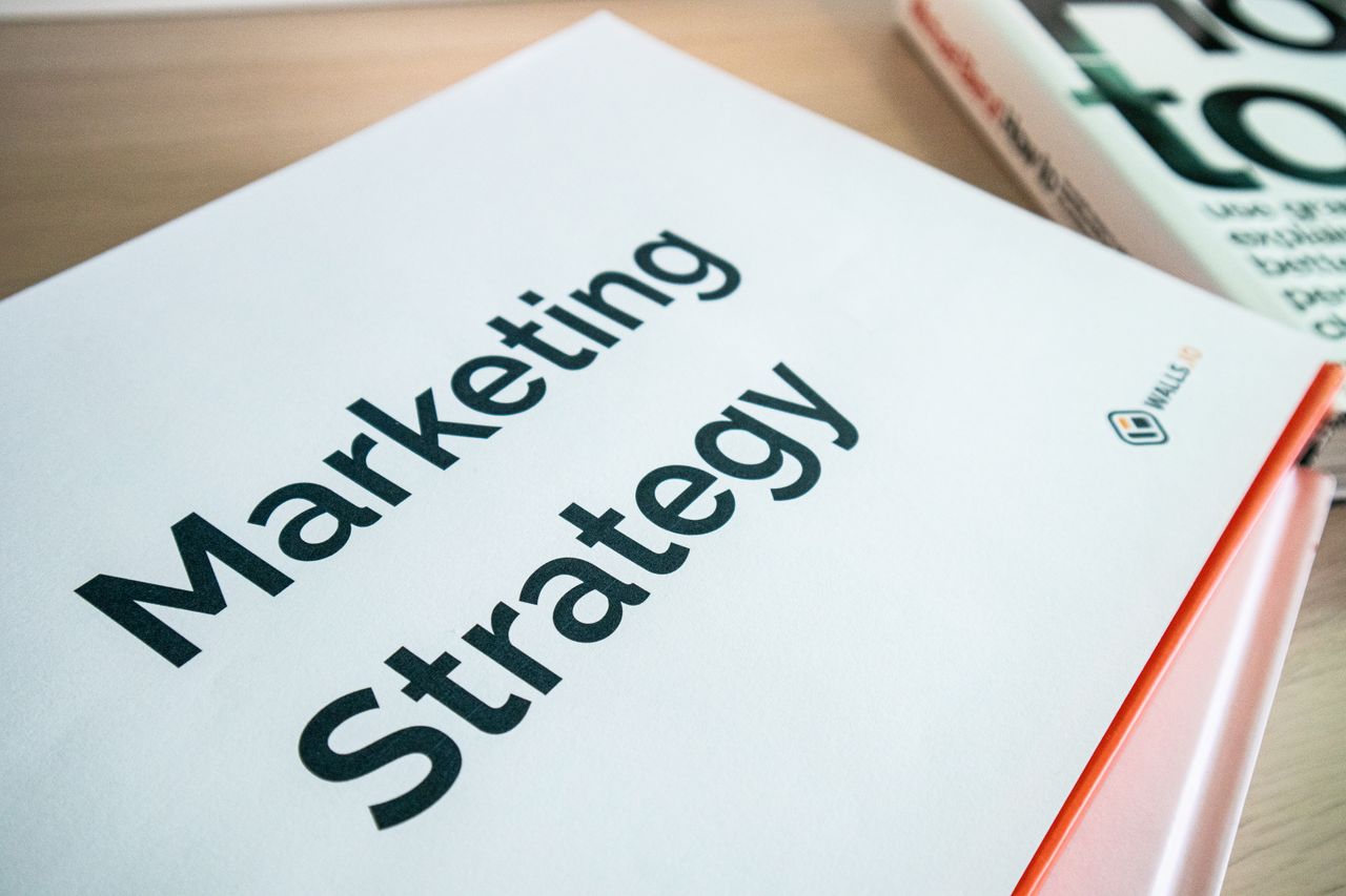 Close-up view of a marketing strategy document laid out on a desk, perfect for business-focused content.